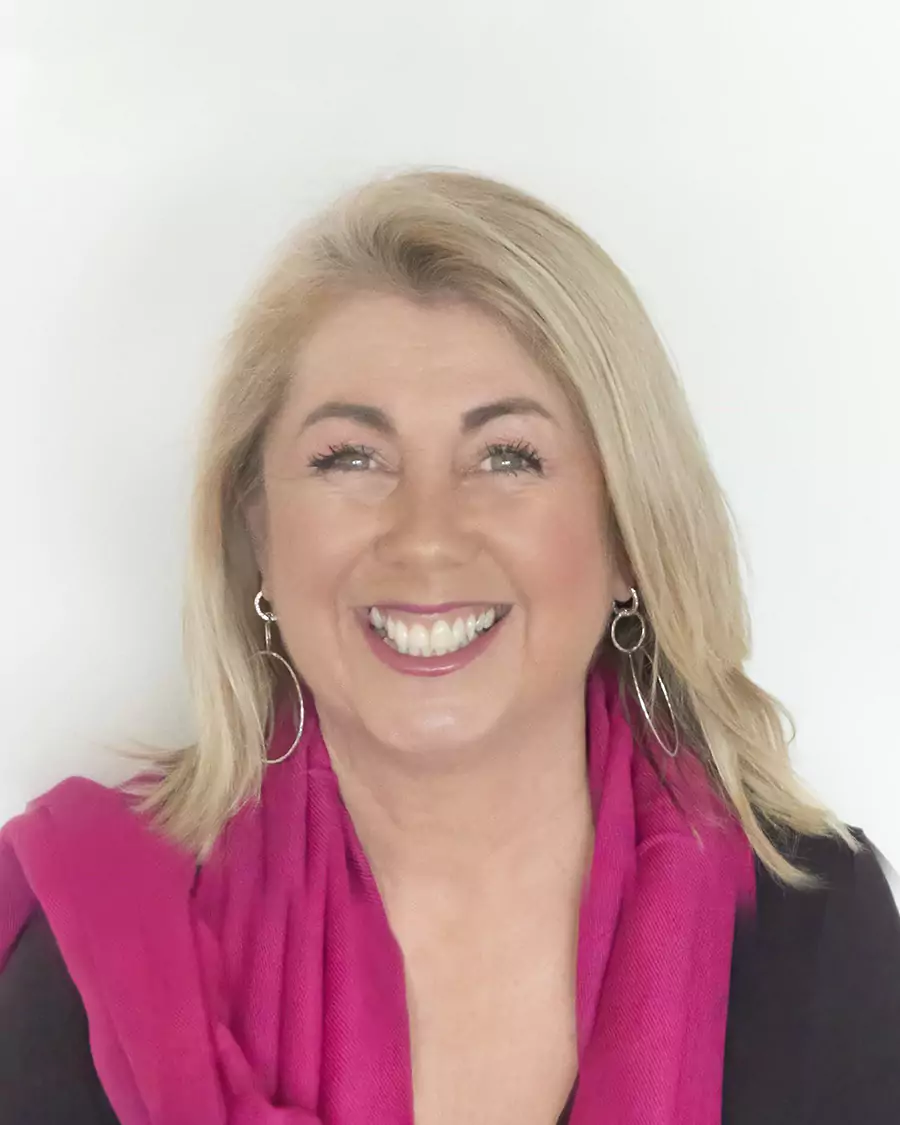 Founder & Director, Kellie Lean, smiling at the camera